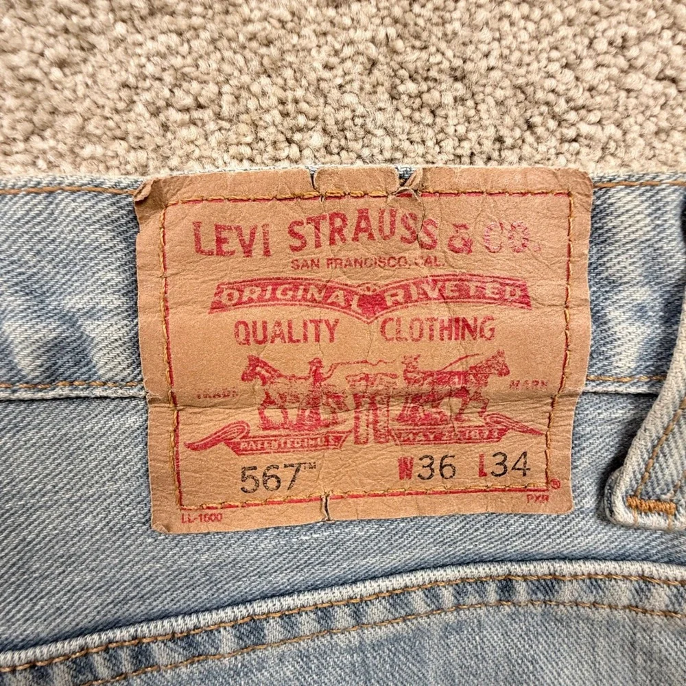 Levi's 567 Loose Boot Cut Jeans Mens 36x31 (tag 36x34) Light Wash Denim Blue Y2K